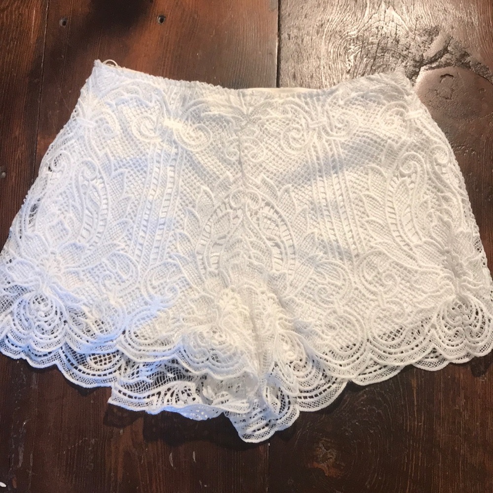 White embellished lace shorts